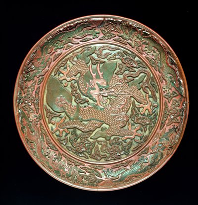 Circular dish decorated with nine dragons, Ming dynasty, Jianjing period by Chinese School